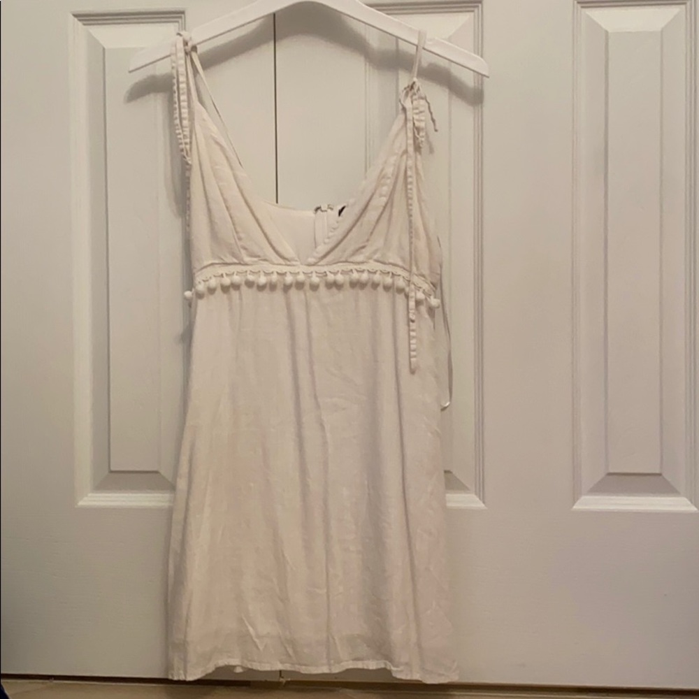 White scoop neck dress